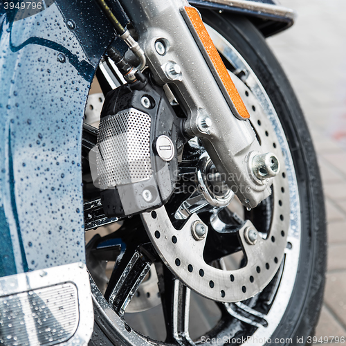 Image of New shiny brake discs on motorcycle