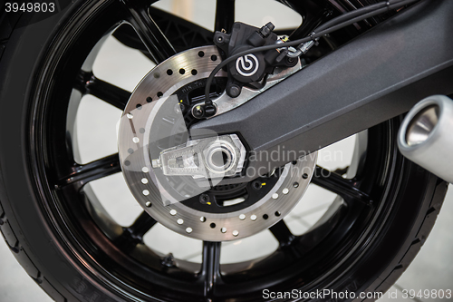 Image of New shiny brake discs on motorcycle