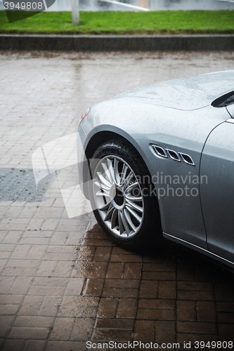 Image of raindrops on modern car