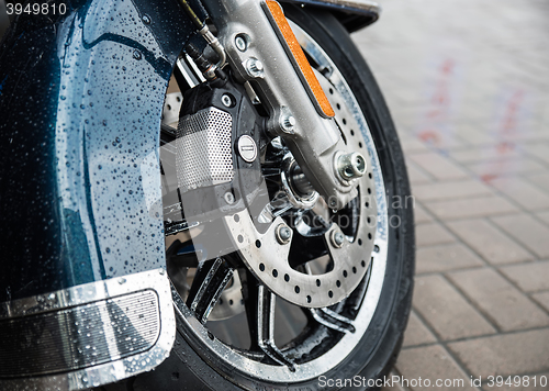 Image of New shiny brake discs on motorcycle