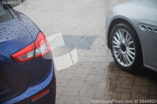 Image of raindrops on modern car