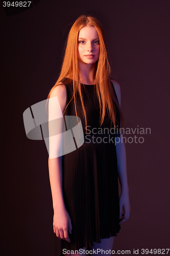 Image of Fashion portrait of beautiful red haired girl