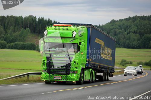 Image of Lime Green Scania Semi Trailer on the Road