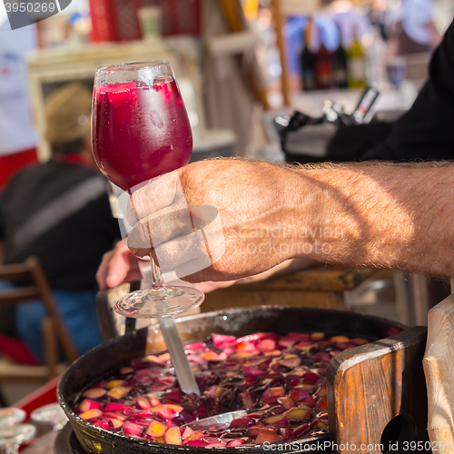 Image of Refreshing sangria served on food stall.