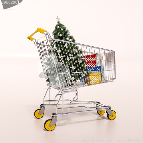 Image of Shopping cart full of purchases in packages and Christamas tree