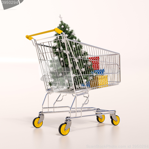 Image of Shopping cart full of purchases in packages and Christamas tree