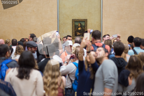 Image of Leonardo DaVinci\'s Mona Lisa in Louvre Museum.