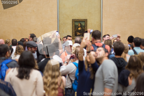 Image of Leonardo DaVinci\'s Mona Lisa in Louvre Museum.