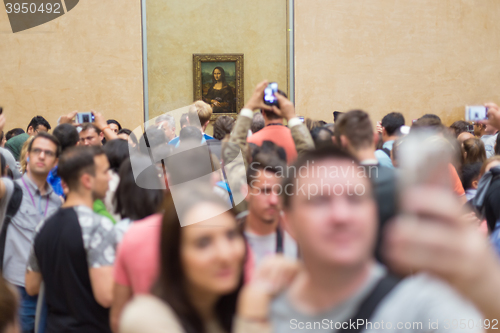 Image of Leonardo DaVinci\'s Mona Lisa in Louvre Museum.