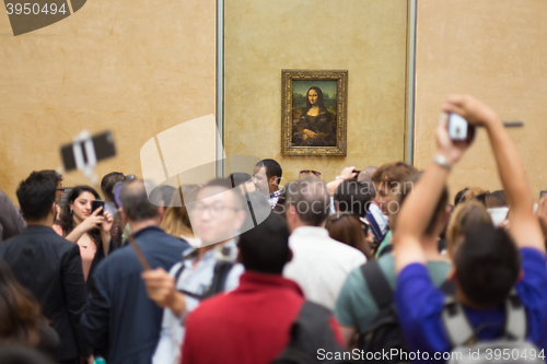 Image of Leonardo DaVinci\'s Mona Lisa in Louvre Museum.