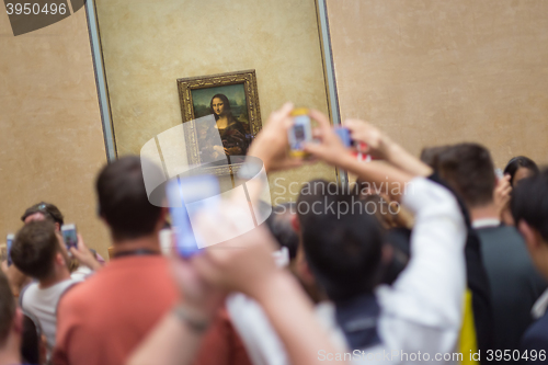 Image of Leonardo DaVinci\'s Mona Lisa in Louvre Museum.