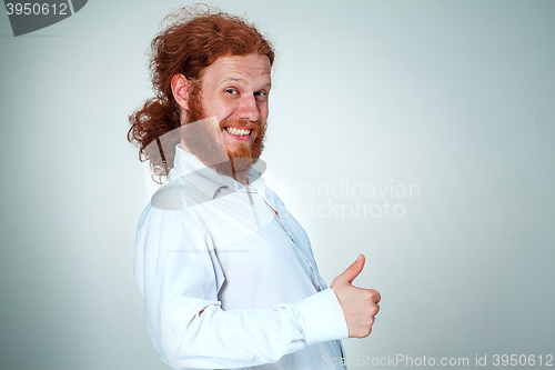 Image of The young man looking at camera