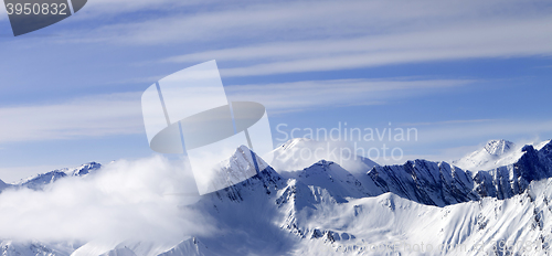 Image of Panoramic view on high mountains in haze