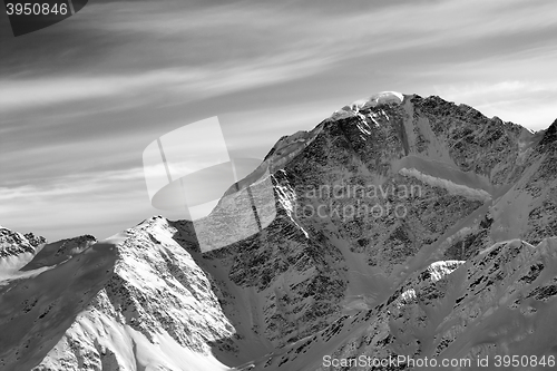 Image of Black and white winter mountains at sun morning
