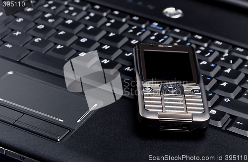 Image of Laptop and Mobile Phone