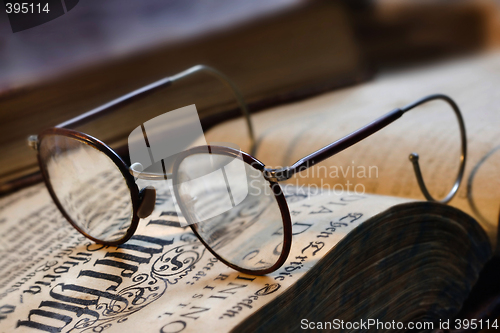 Image of vintage books and glasses