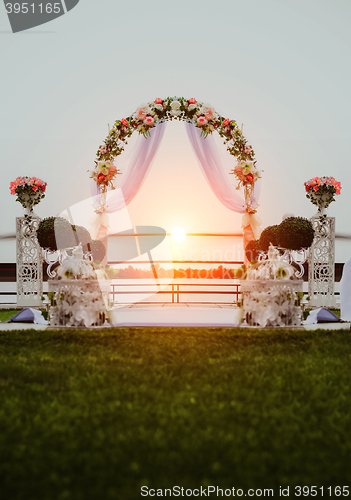 Image of Wedding arch decorated with flowers
