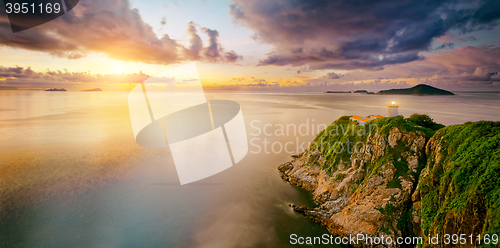 Image of Hong Kong lighthouse during sunrise