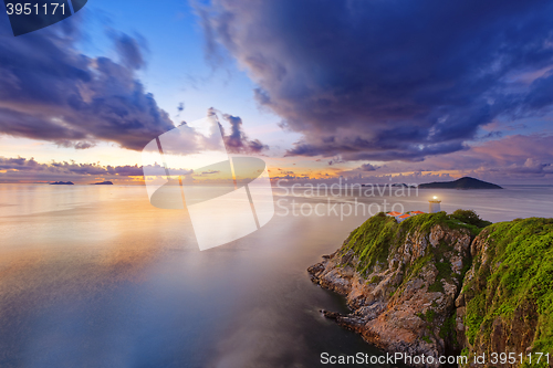 Image of Hong Kong lighthouse during sunrise