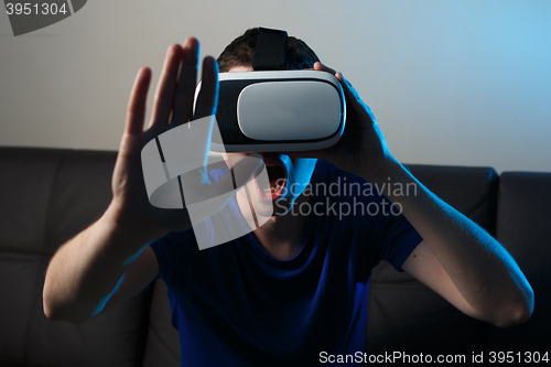 Image of Man using VR glasses