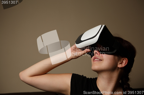 Image of Woman with glasses of virtual reality