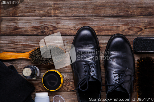 Image of Shoe wax, brush and boot