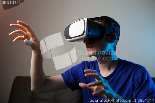 Image of Man using VR glasses