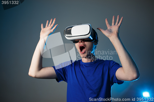 Image of Man using VR glasses