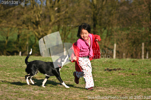 Image of Child and dog