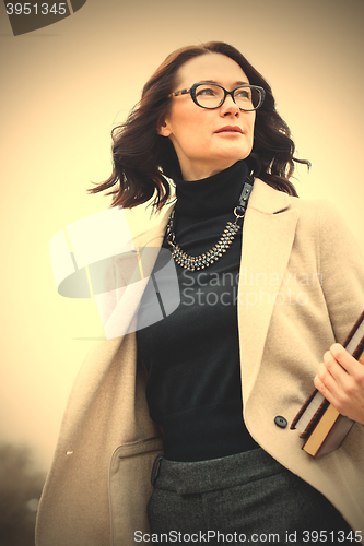 Image of woman teacher with books