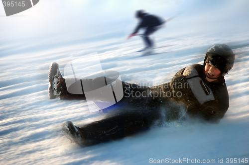 Image of Boy on sled