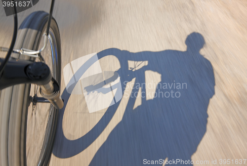 Image of Fast motion bike on a road