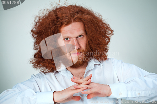 Image of The young man looking at camera