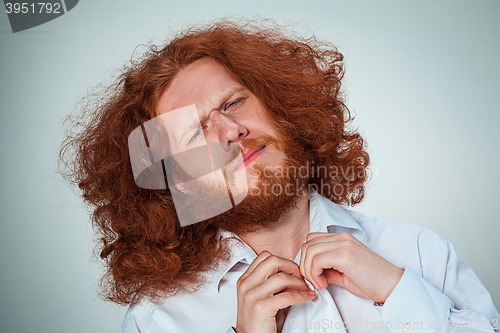 Image of The young man looking at camera