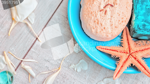 Image of Spa background with starfish and a set of soap