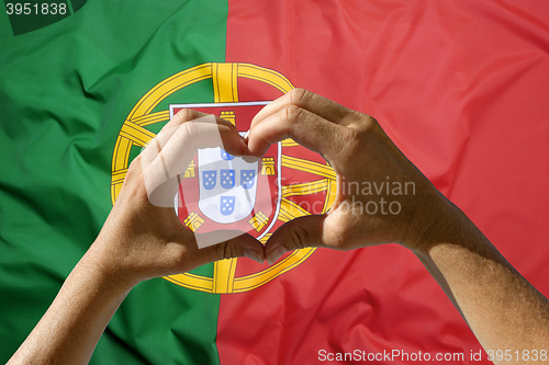 Image of Hands heart symbol, Portugal flag