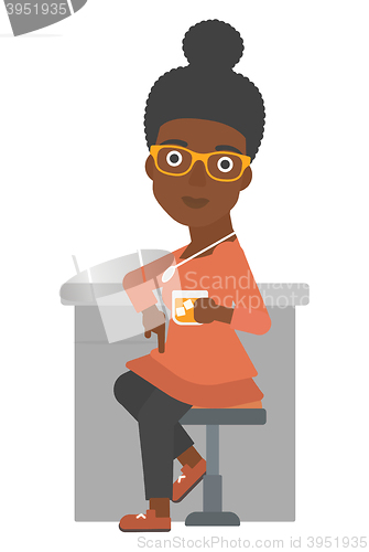 Image of Woman sitting at bar.