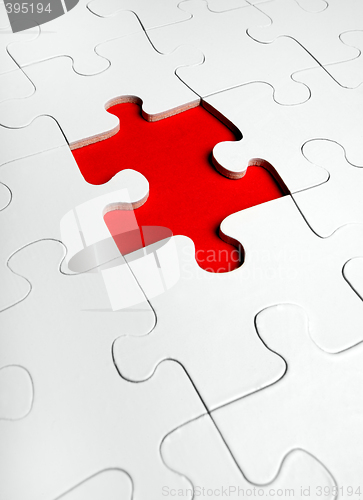 Image of  jigsaw puzzle with the missing piece