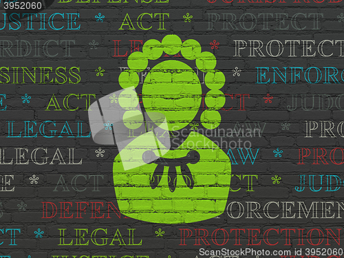Image of Law concept: Judge on wall background