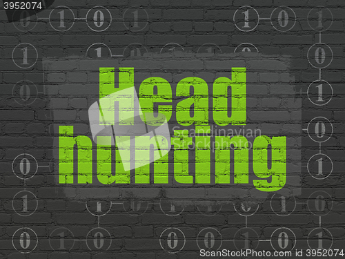 Image of Finance concept: Head Hunting on wall background