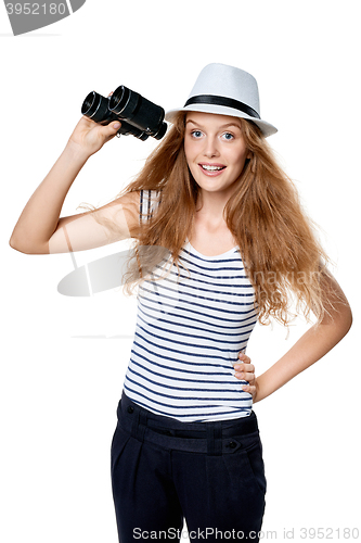 Image of Female looking through binoculars