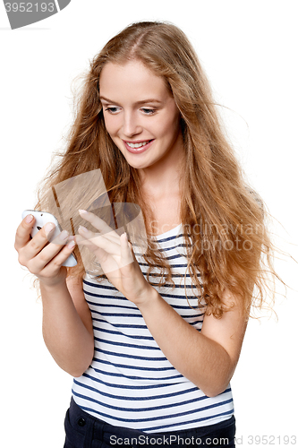 Image of Woman texting on her cell phone