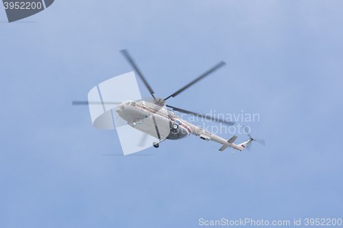 Image of Anapa, Russia - March 10, 2016: Russian helicopter Mi-8 MTV-1 in flight, in the colors of the Russian Emergencies Ministry