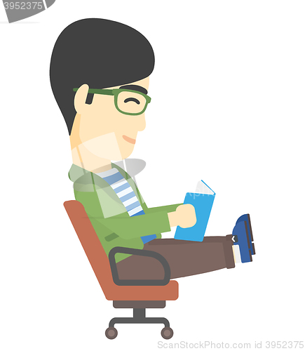 Image of Businessman reading book.