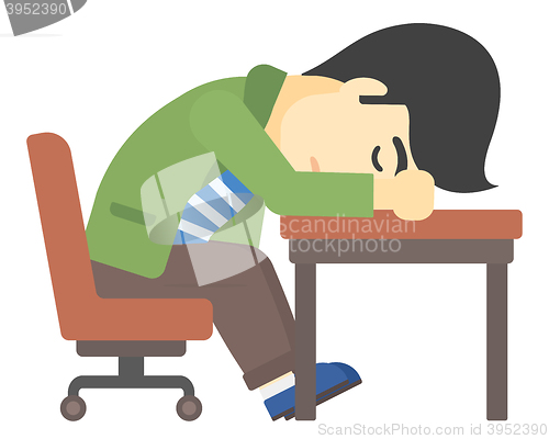 Image of Man sleeping on table.