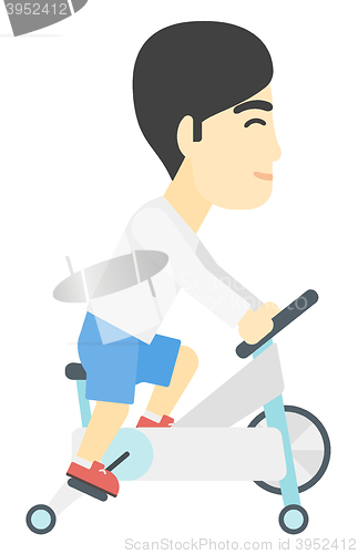 Image of Man doing cycling exercise.