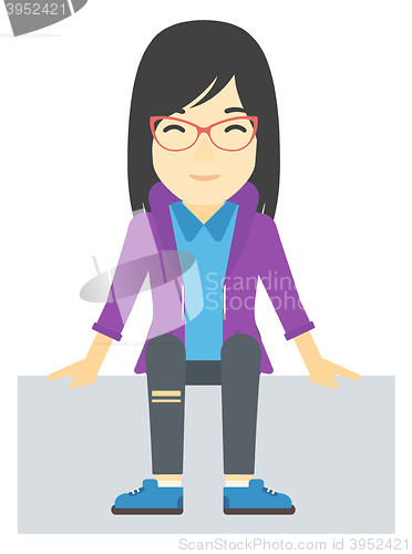 Image of Smiling woman sitting.
