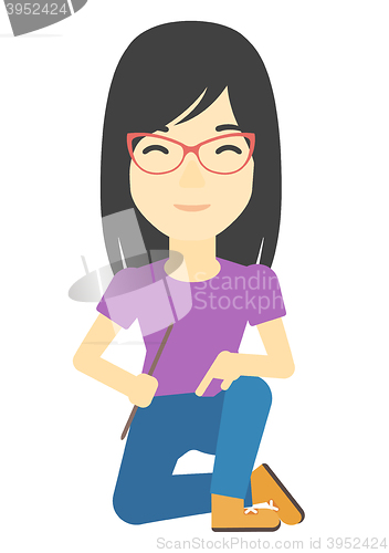 Image of Smiling woman sitting.