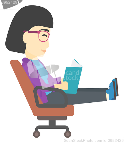 Image of Business woman reading book.