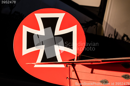 Image of Close-up of an old german triplane, iron cross painting